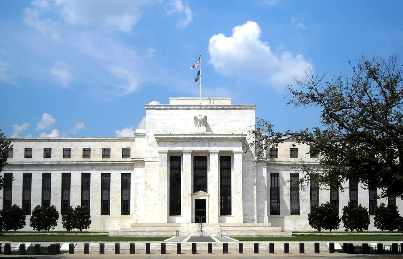 The Marriner S. Eccles Federal Reserve Board building in Washington under a blue sky