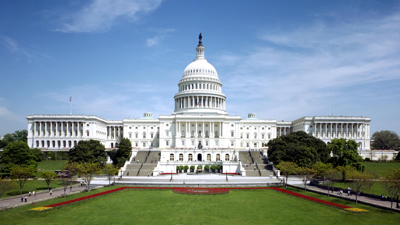 The west front of the United States Capitol under a clear sky